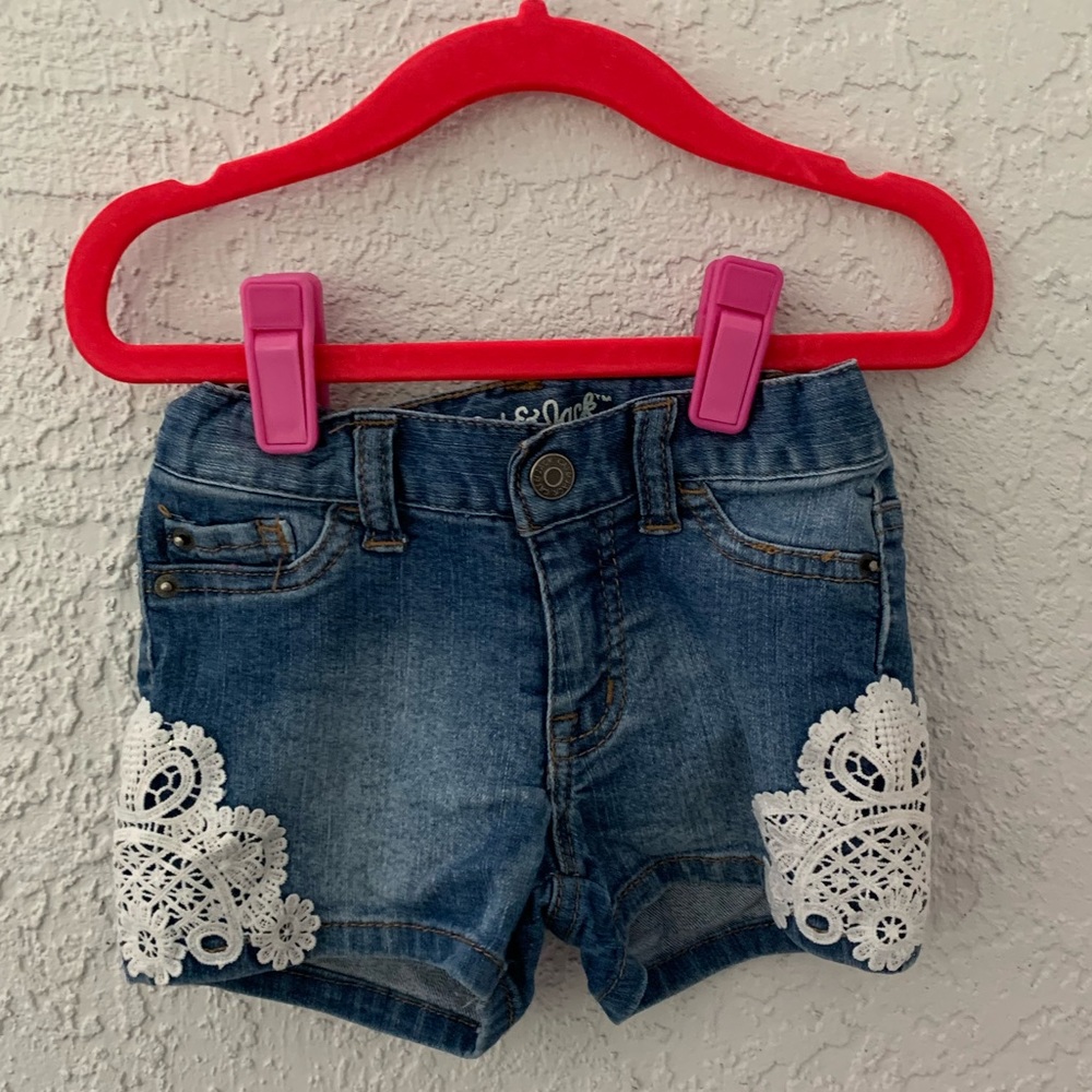 Denim shorts with lace patch